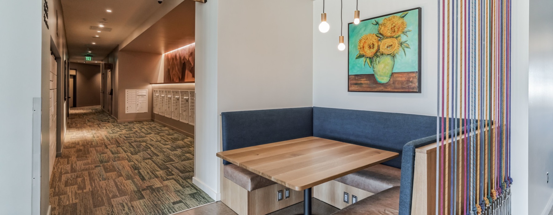 a room with a table and a booth