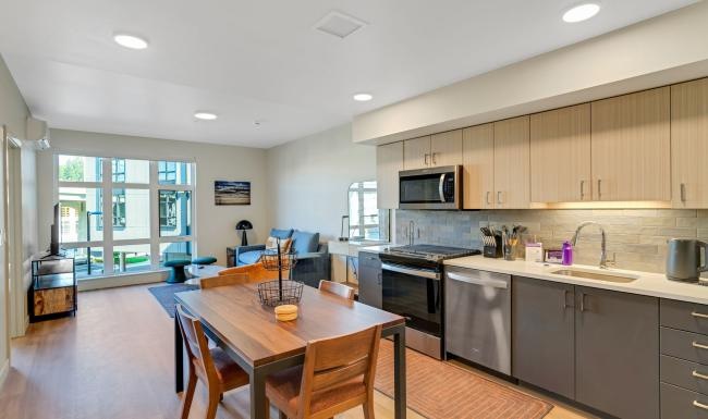 a kitchen with a dining table