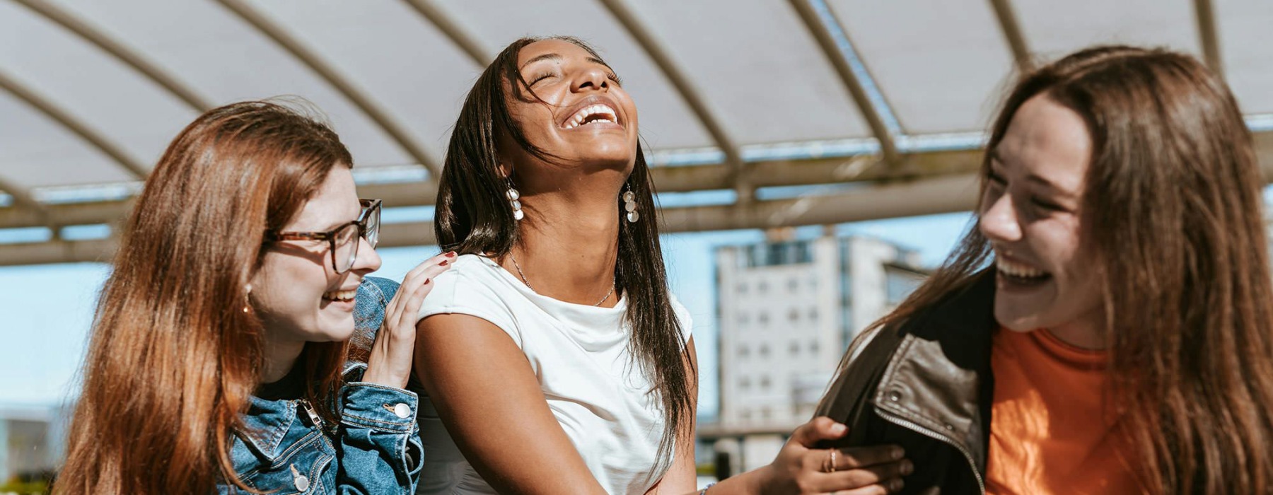 A group of women laughing.